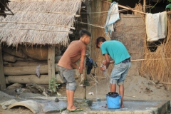 Kids doing the laundry by hand