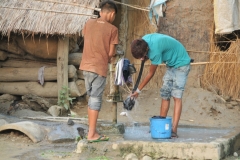 Ringing out a pair of pants by hands. Kids in the US are you seeing this?