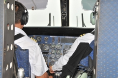 Flight from Chitwan to Kathmandu in a small twin engine plane. No one bothers to close the cockpit door. There is none.