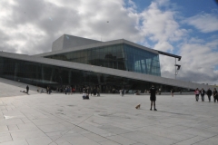 The Oslo Opera House is the home of the Norwegian National Opera and Ballet, and the national opera theater in Norway. The angled exterior surfaces of the building are covered with marble from Carrara, Italy and white granite and make it appear to rise from the water.