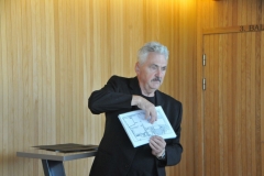 Our tour guide showing up the diagram of this huge opera house.