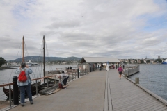 Arriving dockside to visit the ancient sailing ship the FRAM across the harbor from the city.