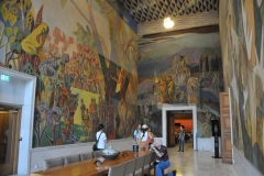 Once you step inside Oslo City Hall, the enormous paintings in brilliant hues on display will enthrall you.