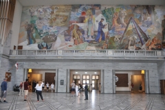 The building's main hall was decorated by Henrik Sørensen and Alf Rolfsen. The Hall is 93 feet wide, 117 feet  long and around 63 feet high. The floor and parts of the walls are clad in marble. The room has a series of wall paintings depicting Norway and Oslo between the wars and also during occupation. They also depict the growth of commercial activity in the city, including the rise of the labor movement. Various monarchs and the city's patron saint, St. Hallvard are also depicted.