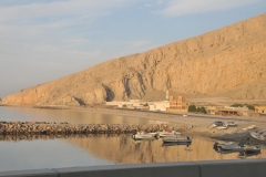 Pass through Ajman, the smallest of the Emirates - Enter Oman via the panoramic coastal road overlooking the Gulf of Arabia and the Straits of Hormuz. Destination is Khasab, local Capital of the Governorate of Musandam. "The Norway of Arabia".