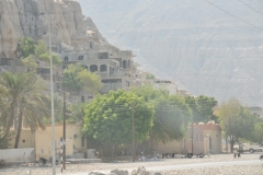 Homes built above the dry river bed