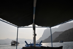 Looking through above the bow of the boat and the scenery