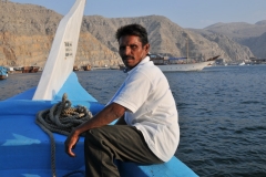 Crewman at the bow coming into port