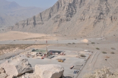 Look beyond the Oil Field in the foreground and you will see a long piece of flat concrete and concrete with an inverted V. This is a private Military training Range for long range Weapons Firing Range