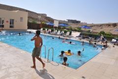 Pool at Sur Plaza Hotel in Sur.. These are kids are local that were permitted to come and use the pool.