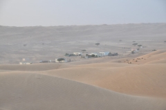In the middle of the blowing sand you find civilization and a home