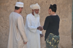 Laura our tour guide is talking with him along with our Omani guide.