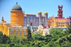 The castle stands on the top of a hill in the Sintra Mountains above the town of Sintra,