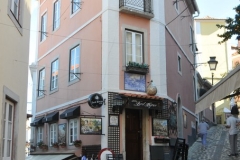 Stairs wrap around the entrance to a cantina.