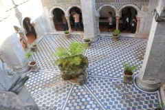 Looking down at the patio area from the floor above.