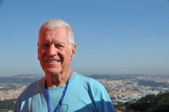 Photo of myself at the top of the Palace with the view in the background of the countryside.