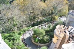 Tourists below waiting in the line to get in after purchasing admission tickets.