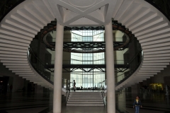 Main entrance with grand stairs to second and third floors.