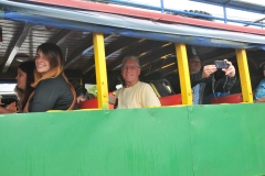 Check out this local bus with no windows and benches to sit on