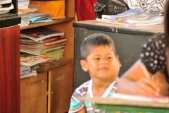 Young student has a tumor growing on the right cheek