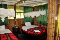 Inside the hut with mosquito nets for night time use