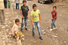 Kids splaying marbles