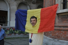 The Romanian Revolution was a period of violent civil unrest in Romania in December 1989 and part of the Revolutions of 1989 that occurred in several countries. The Romanian Revolution started in the city of Timișoara and soon spread throughout the country, ultimately culminating in the show trial and execution of longtime Communist Party General Secretary Nicolae Ceausescu and his wife Elena, and the end of 42 years of Communist rule in Romania.Egmond shows us the center of the Romanian flag had been cut out to insert a head into the flag.