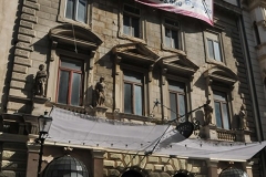 Original architecture from the early 19th century with statues built  into the building.