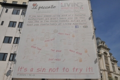 The whole sign an advertisement for a hotel nearby.