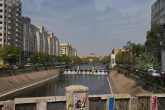 The river that flows thorugh the center is the Dambovita River, a tributary of the Danube.