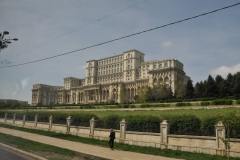 The Palace of the Parliament is the seat of the Parliament of Romania. Located  in central Bucharest.  It is the second largest administrative building in the world, if excluding the Pentagon  with a height  of 276 ft, an area of 3,930,000 sq ft and a volume of 90,000,000 cu feet. In terms of weight, the Palace of the Parliament is the heaviest building in the world.