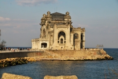 This is the old Constanta Casino,  long been closed located near the  harbor. The old Casino and the surrounding promenade was opened in 1911. It was built in the Art Nouveau style and conceived by two architects, Petre Antonescu and Daniel Renard.  Despite being in a state of disrepair nowadays it can be visited for free. It's an amazing piece of architecture that definitely deserves a visit.