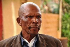 Tashia, killed all her family.  He explained what happened when the Hutu's murdered, raped and wiped out families during this horrible time in history.  He was sentenced to prison and served time. His own family disowned him and he is alone now. He asked for forgiveness from Janet. Today he helps her when she asks for help.   You could have heard a pin drop when each of them spoke. Many are in the villages because of Prison Fellowship Rwanda – an Anglican organization working with the National Unity and Reconciliation Commission. The NGO supplies the materials that the victims and perpetrators use to build their homes.