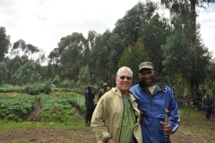 This is my friend Danial, my Porter who assisted me from the farming floor to 7,000 feet, under some really tough weather conditions,  very slippery muddy, barely a path at all up and down to and from  7,000.  This was one of the most difficult climbs to almost 10,000 feet I have made in many years.  We were very fortunate to see the Silver back.