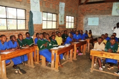I counted over 50 students in the class. In the entire school of over 2,000 students there is not one light bulb in the entire school.