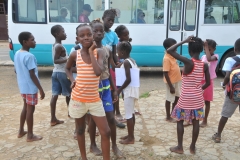 More kids milling around checking out the tourists that just happen to stop in their small village, very close into Sao Tome. .