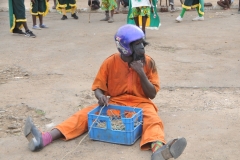 A good guy is dressed as a local bringing in crops for his family and village.