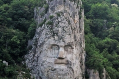 Rock Statue of Decebalus in the Iron Gates Gorge is a carving in rock of the face of Decebalus, the last king of Dacia, who fought against the Roman emperors  to preserve the independence of his country, which corresponded to modern Romania.