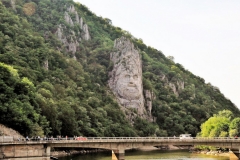 The  sculpture was made between 1994 and 2004, on a rocky outcrop on the river Danube, at the Iron Gates, which form the border between Romania and Serbia. It is located near the city of Orșova in Romania.