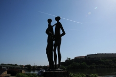 Interestingly a jet plane races across the sky at the exact moment the photo was taken balancing a cone trail on the head of the right bronze figure.