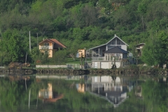 In the 1960's the former Yugoslavia, now part of Serbia and Romania cooperated on a joint venture that raised the level of the Danube with a series of Hydroelectric dams called the Iron Gates.  The Danube is now placid between the Iron Gates, the long gorge is now underwater.   This part is known as Iron Gate 2  as we are sailing from the Black Sea back toward Budapest in reverse of the normal trips. .