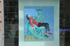 I found this in a window of a business for sale. Michael Jackson being held in the arms of Statue of Liberty. dead