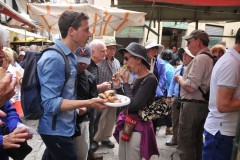 Since it is close to lunch time we have a chance to sample local street food. And here we are tasting the samples.  It tasted pretty good.  Definitely different.