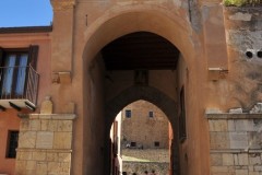 Entrance into the Castle in the distance through the Arch from the main street in the previous photo. .