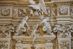 The Masters who built the chapel decorations presents a riot of cherubs frolicking, fluttering draperies and many imaginary  creatures, specimens of a bizarre and mysterious nature.