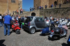 In the middle of it all we discovered a  Smart Car which was the lead vehicle for many of the riders.  which in Sicily looks like a large car. Remember those narrow alleys.