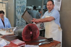 That is one heck of a big tuna being carved up.