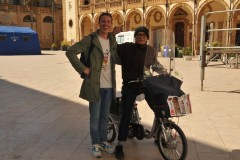 This guy on the tricycle had music blaring with the Nation anthem of Italy. Giovanni is with him. I think he could have been the official greeter from the Chamber of Commerce.