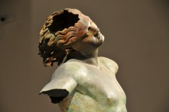 Though the satyr is missing both arms, one leg and its separately-cast tail  its head and torso are remarkably well-preserved despite millennia spent at the bottom of the sea. The satyr is depicted in mid-leap, head thrown back ecstatically and back arched, his hair swinging with the movement of his head. The fracture is highly refined; the whites of his eyes are inlays of white alabaster.