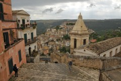 Ragusa  is a city in southern Italy. It is the capital of the province of Ragusa, on the island of Sicily, with 73,288 inhabitants in 2016. It is built on a wide limestone hill between two deep valleys, Cava San Leonardo and Cava Santa Domenica.